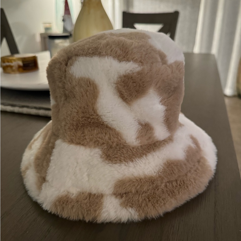 Cow print bucket hat.